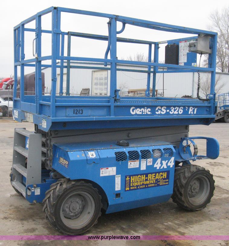 image for item I5638 2002 Genie GS3268RT scissor lift