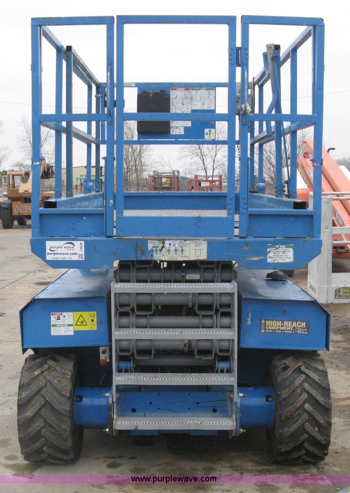 image for item I5638 2002 Genie GS3268RT scissor lift