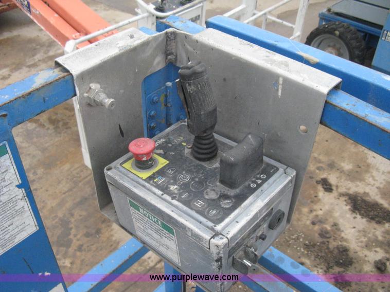 image for item I5638 2002 Genie GS3268RT scissor lift