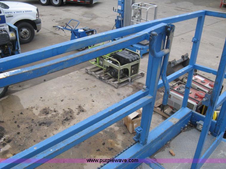 image for item I5638 2002 Genie GS3268RT scissor lift