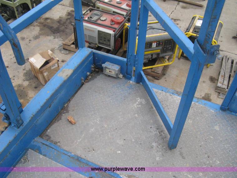 image for item I5638 2002 Genie GS3268RT scissor lift