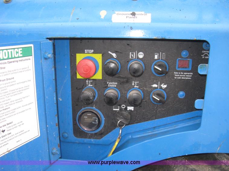 image for item I5638 2002 Genie GS3268RT scissor lift