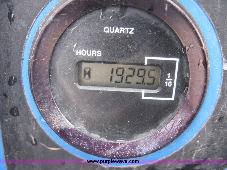 image for item I5638 2002 Genie GS3268RT scissor lift