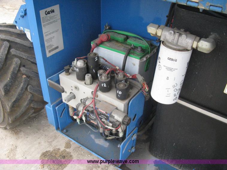 image for item I5638 2002 Genie GS3268RT scissor lift