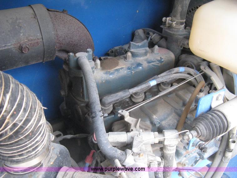 image for item I5638 2002 Genie GS3268RT scissor lift