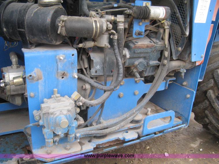 image for item I5638 2002 Genie GS3268RT scissor lift