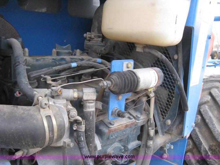 image for item I5638 2002 Genie GS3268RT scissor lift