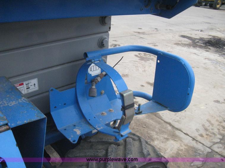image for item I5638 2002 Genie GS3268RT scissor lift