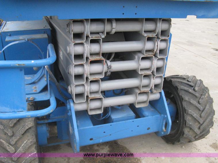 image for item I5638 2002 Genie GS3268RT scissor lift