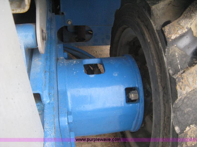 image for item I5638 2002 Genie GS3268RT scissor lift