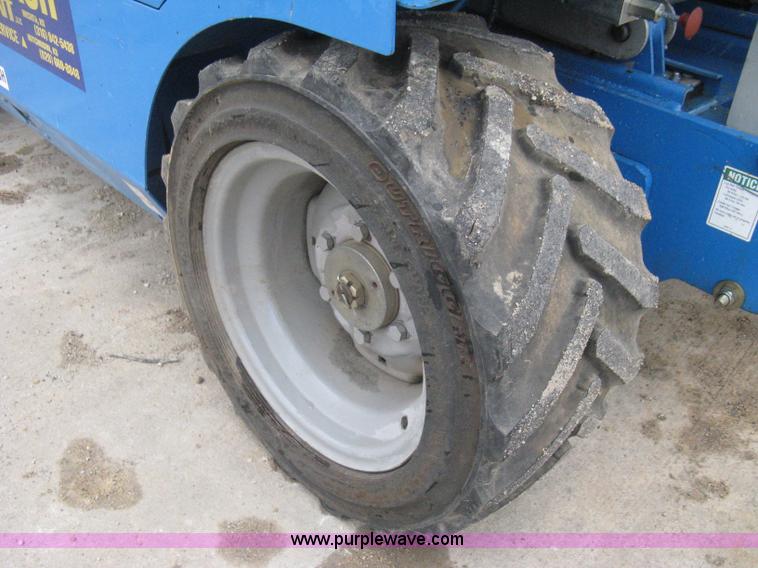 image for item I5638 2002 Genie GS3268RT scissor lift