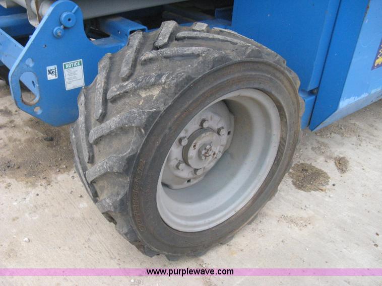 image for item I5638 2002 Genie GS3268RT scissor lift