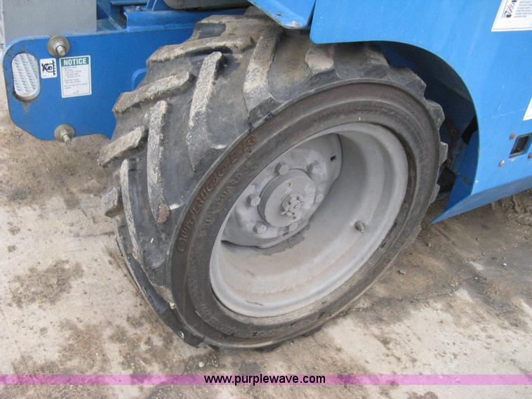 image for item I5638 2002 Genie GS3268RT scissor lift