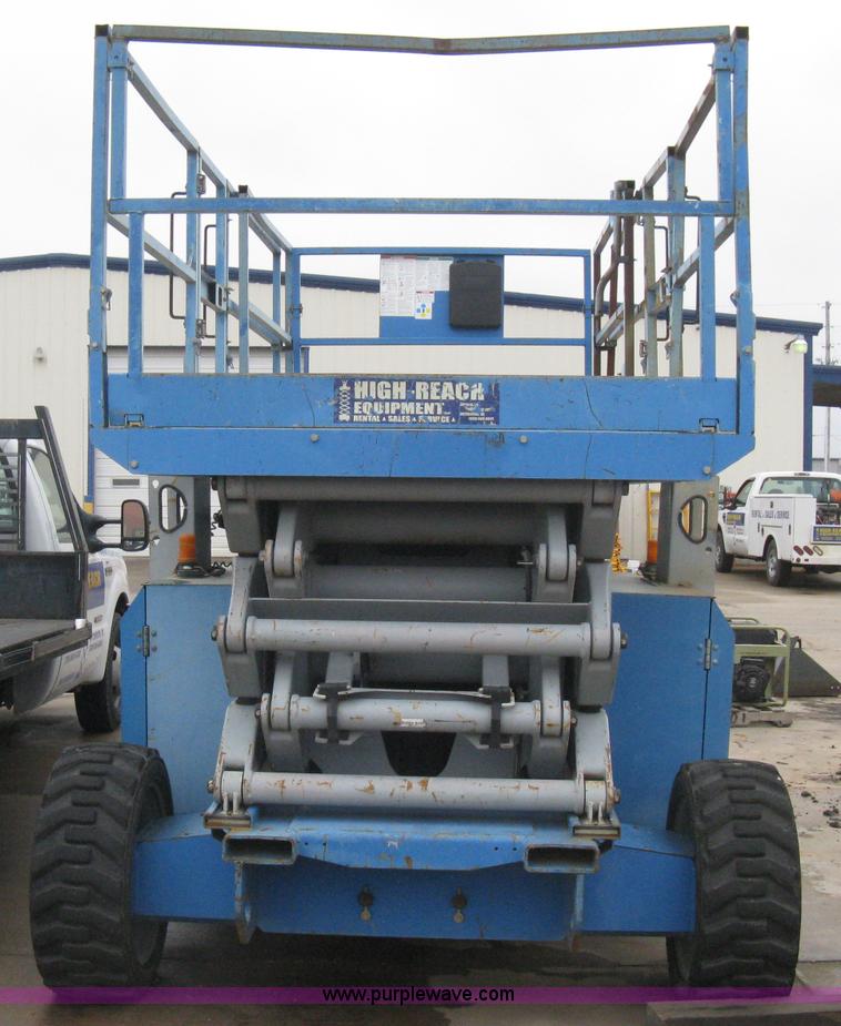 image for item I5652 2004 Genie GS-4390 rough terrain scissor lift