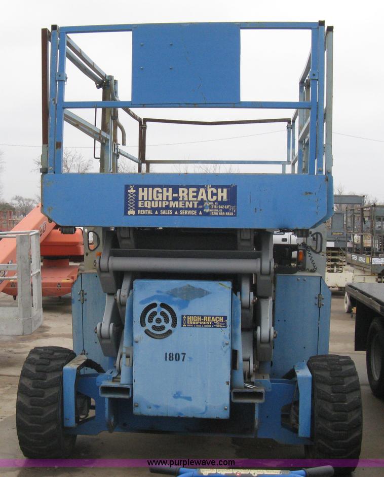 image for item I5652 2004 Genie GS-4390 rough terrain scissor lift