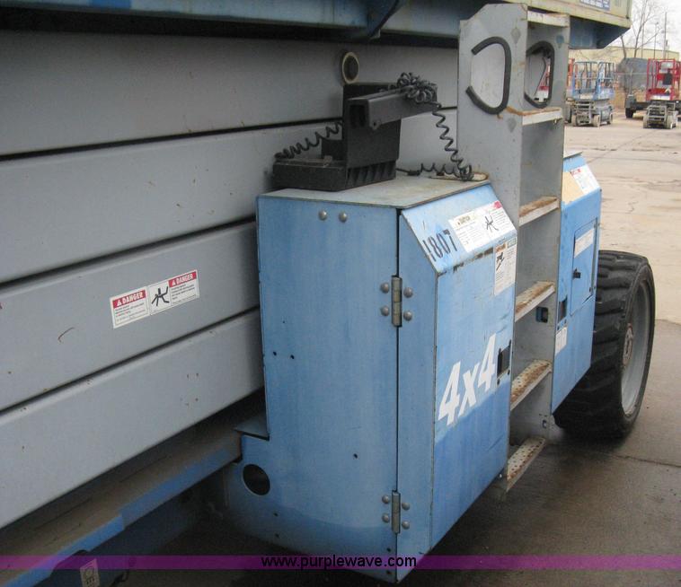 image for item I5652 2004 Genie GS-4390 rough terrain scissor lift