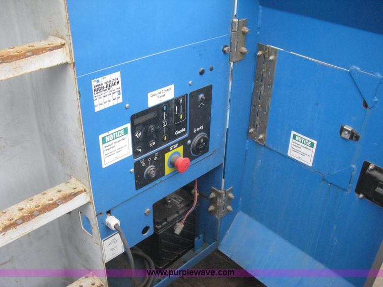 image for item I5652 2004 Genie GS-4390 rough terrain scissor lift