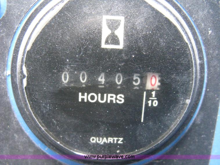 image for item I5652 2004 Genie GS-4390 rough terrain scissor lift