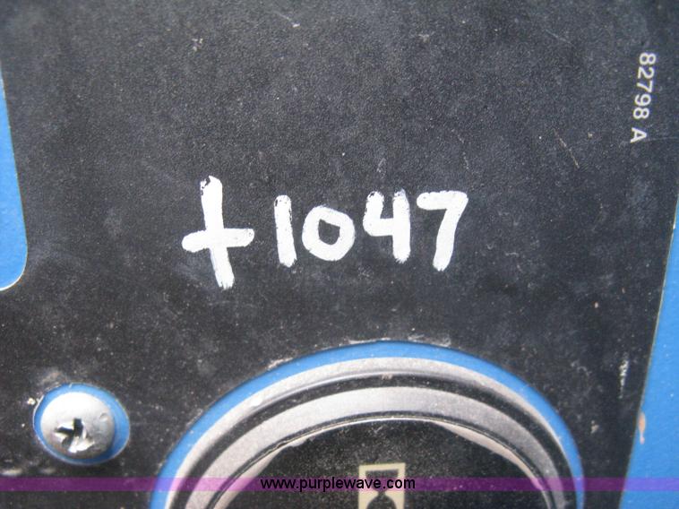 image for item I5652 2004 Genie GS-4390 rough terrain scissor lift