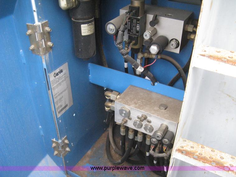 image for item I5652 2004 Genie GS-4390 rough terrain scissor lift