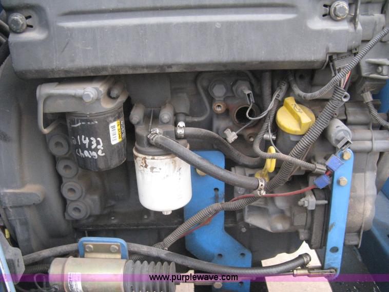 image for item I5652 2004 Genie GS-4390 rough terrain scissor lift