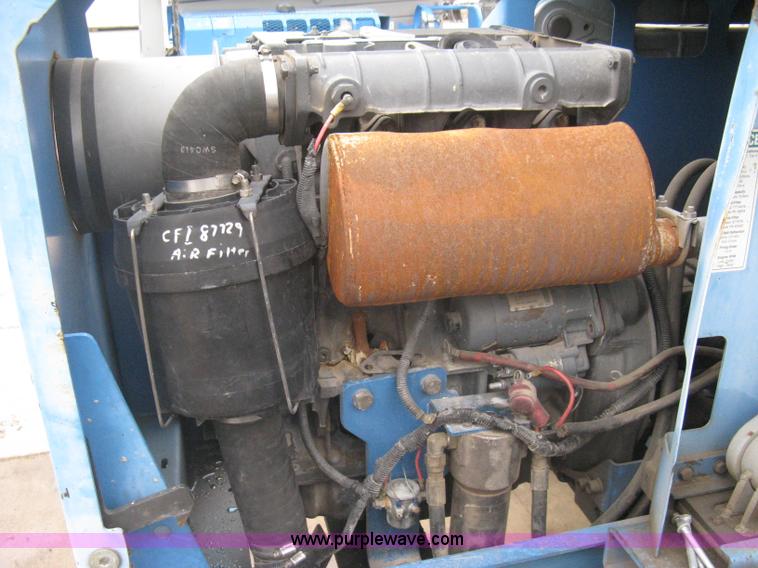 image for item I5652 2004 Genie GS-4390 rough terrain scissor lift