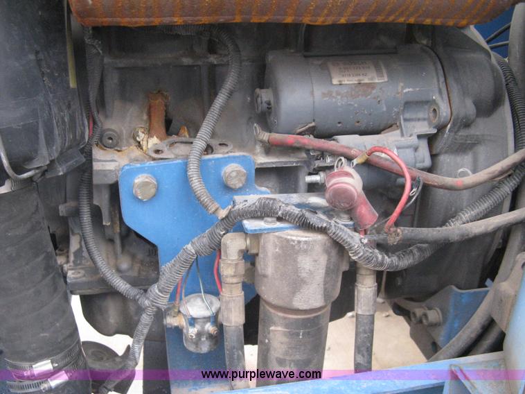 image for item I5652 2004 Genie GS-4390 rough terrain scissor lift