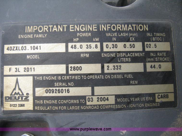 image for item I5652 2004 Genie GS-4390 rough terrain scissor lift