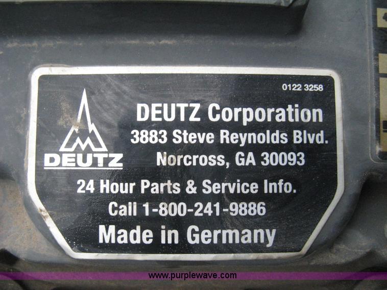 image for item I5652 2004 Genie GS-4390 rough terrain scissor lift