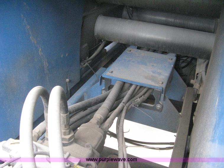 image for item I5652 2004 Genie GS-4390 rough terrain scissor lift