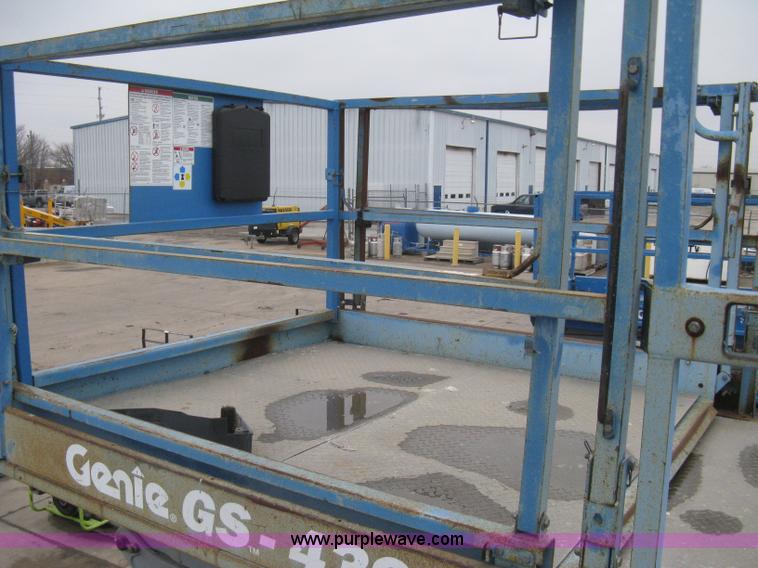 image for item I5652 2004 Genie GS-4390 rough terrain scissor lift