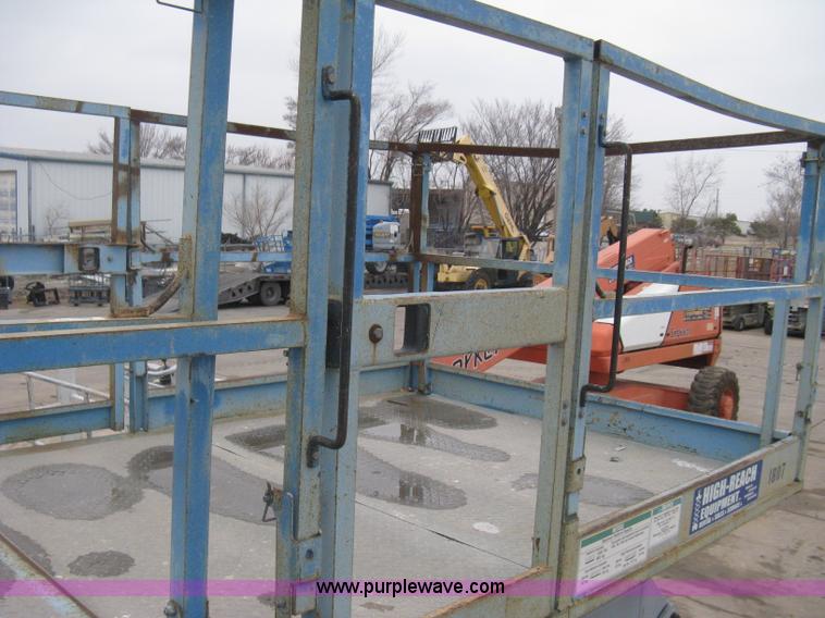 image for item I5652 2004 Genie GS-4390 rough terrain scissor lift