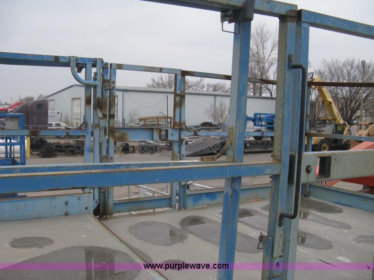 image for item I5652 2004 Genie GS-4390 rough terrain scissor lift