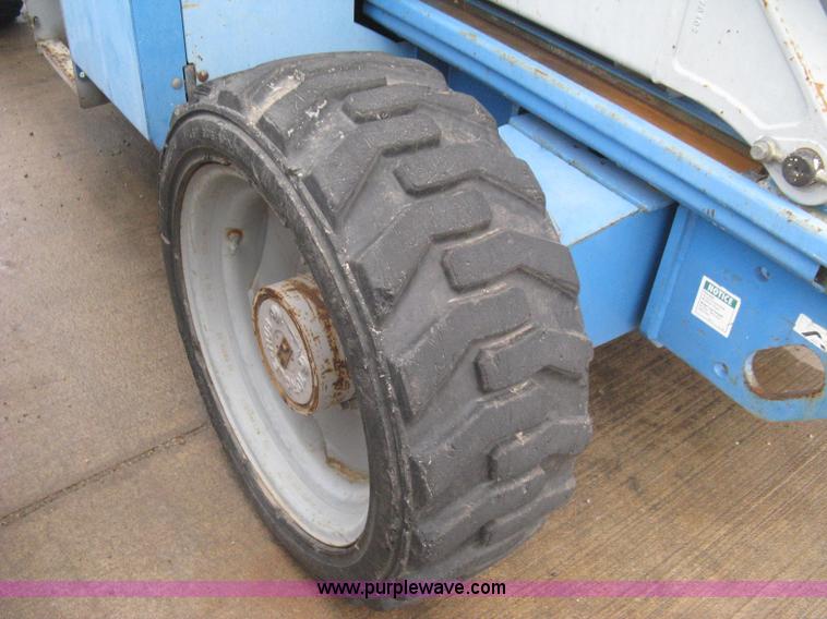 image for item I5652 2004 Genie GS-4390 rough terrain scissor lift