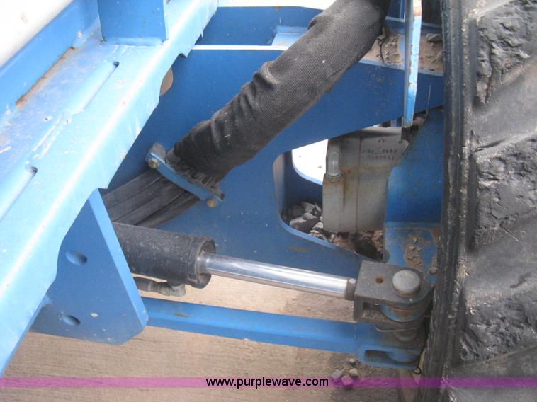 image for item I5652 2004 Genie GS-4390 rough terrain scissor lift