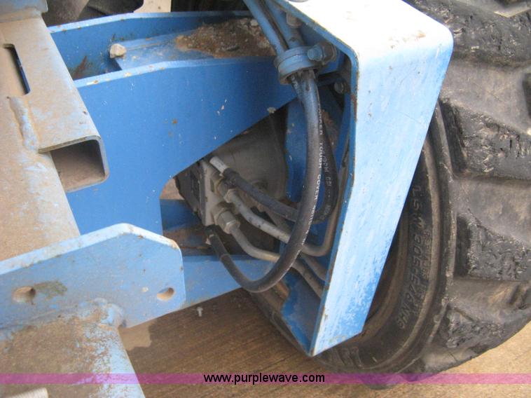 image for item I5652 2004 Genie GS-4390 rough terrain scissor lift