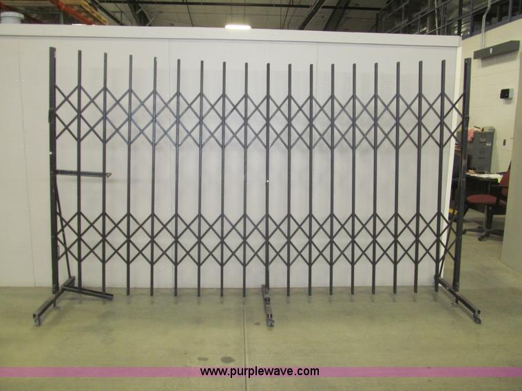 image for item AQ9917 (2) steel folding security gate