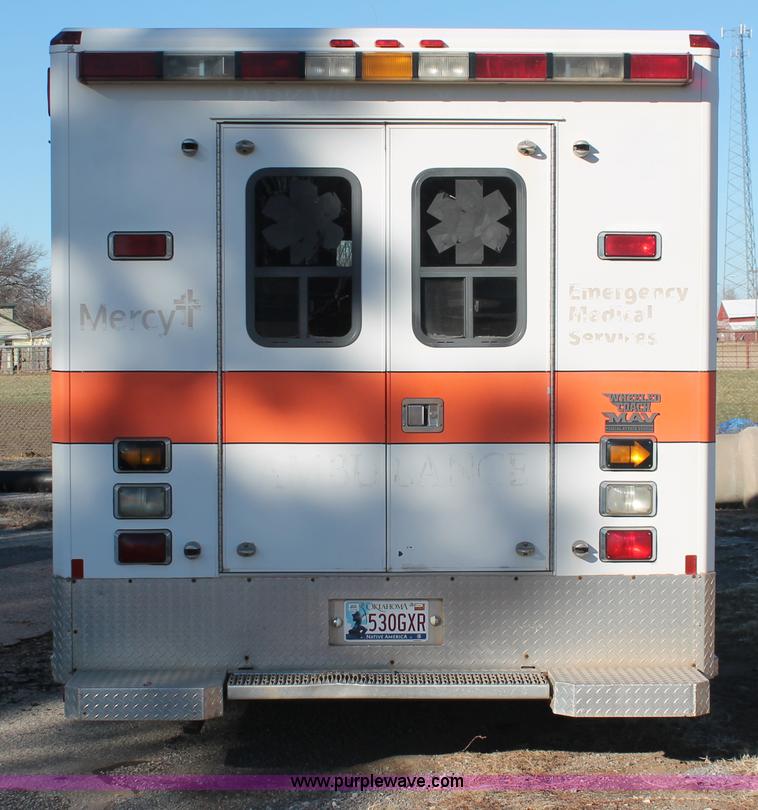 image for item H8289 2000 Freightliner FL60 ambulance