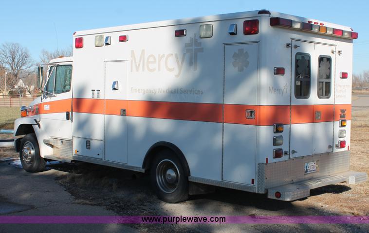 image for item H8289 2000 Freightliner FL60 ambulance