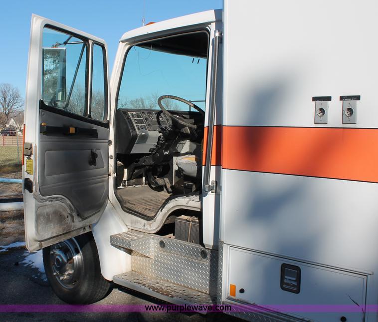 image for item H8289 2000 Freightliner FL60 ambulance