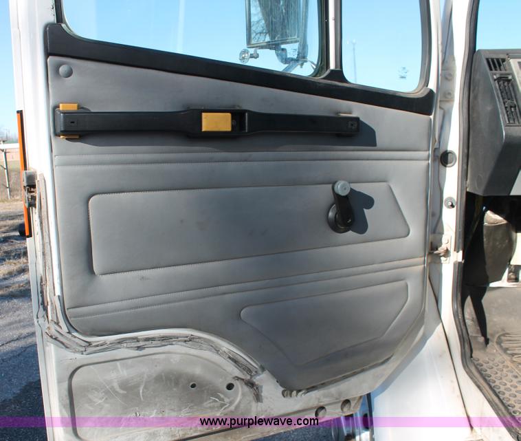 image for item H8289 2000 Freightliner FL60 ambulance