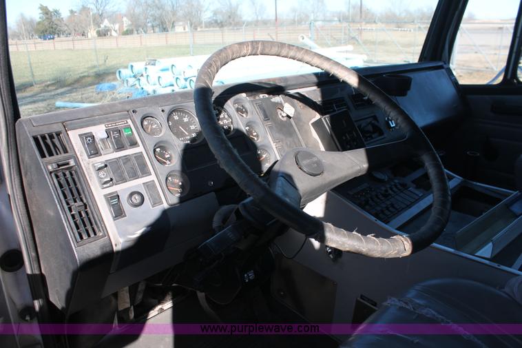 image for item H8289 2000 Freightliner FL60 ambulance