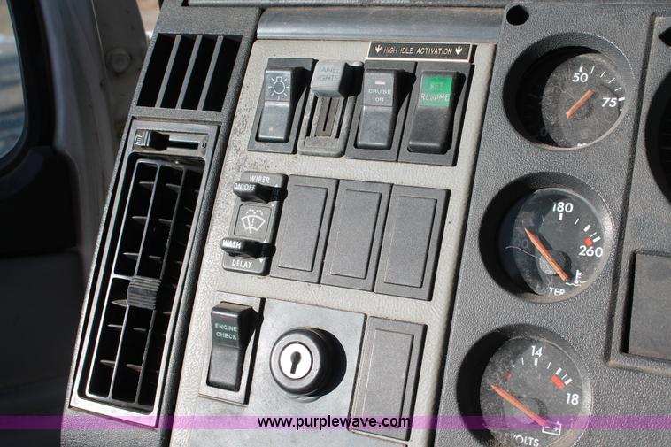 image for item H8289 2000 Freightliner FL60 ambulance