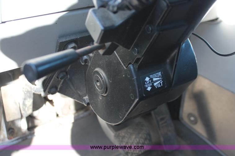 image for item H8289 2000 Freightliner FL60 ambulance