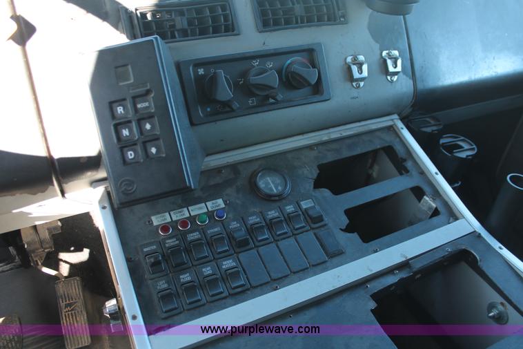 image for item H8289 2000 Freightliner FL60 ambulance