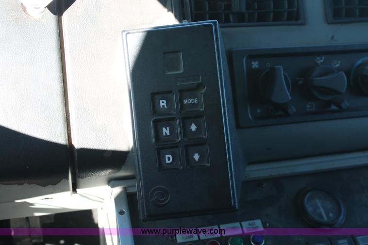 image for item H8289 2000 Freightliner FL60 ambulance