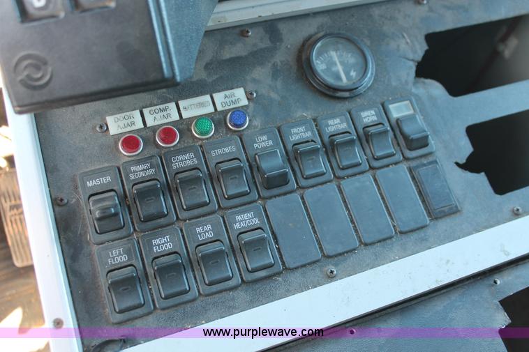 image for item H8289 2000 Freightliner FL60 ambulance