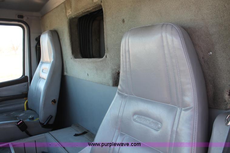 image for item H8289 2000 Freightliner FL60 ambulance