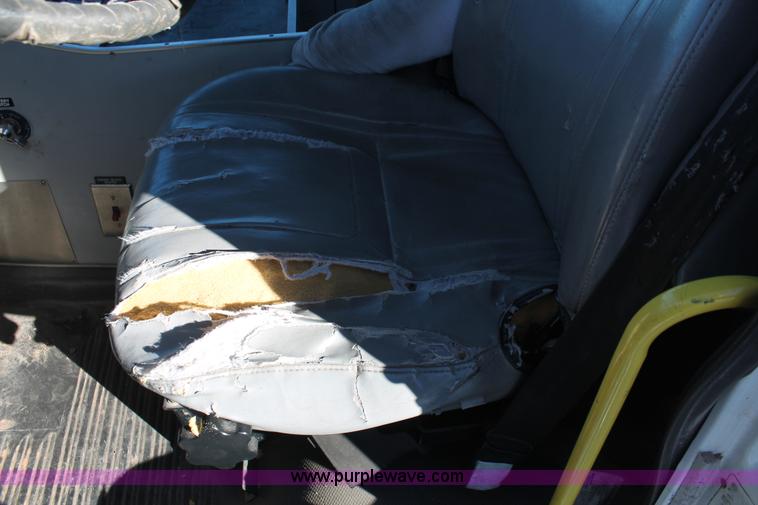 image for item H8289 2000 Freightliner FL60 ambulance