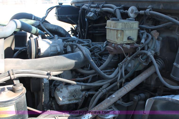 image for item H8289 2000 Freightliner FL60 ambulance